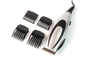 The machine for a hairstyle with attachments. Barbershop. Hair c