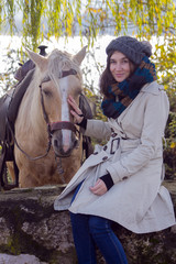 Fototapeta na wymiar Portrait of a girl with a horse