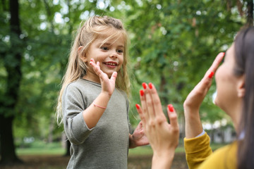 Playful. Mother daughter time.