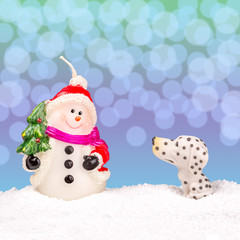 White snowman in the snow