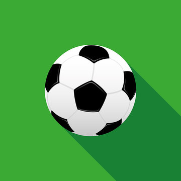 Soccer ball on a green background.