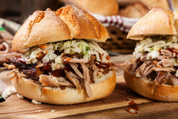 Homemade pulled pork burger with coleslaw salad