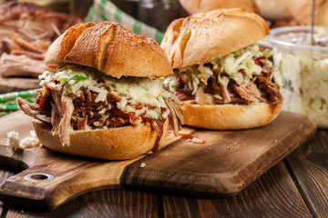 Homemade pulled pork burger with coleslaw salad