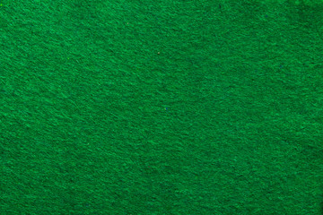 Fototapeta premium The green background on the poker table in the casino