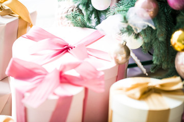 Christmas tree with gifts in Christmas living room. Beautiful New Year decorated classic home interior. Winter background