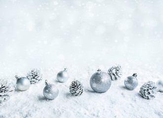 Christmas ball (ornament) on snow background.For christmas concepts or new year,celebration ideas.