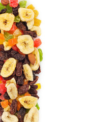 Dried fruits border isolated on white