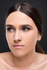 Fototapeta premium Beautiful face of young woman with clean skin
