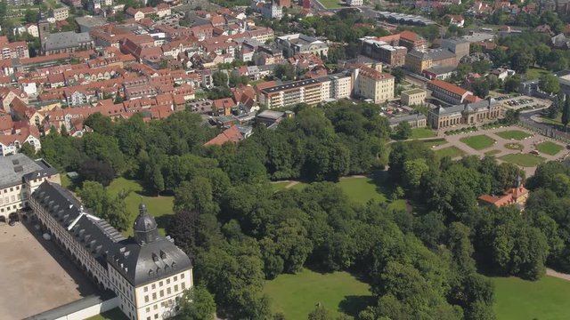 Aerial drone pan to left over Gotha castle village city in Germany 4k 
