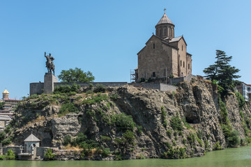 Fototapeta na wymiar Tbilisi, Georgia, Eastern Europe - Metekhi Church next to the Mtkvari River.