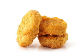 Fried chicken nuggets isolated on white