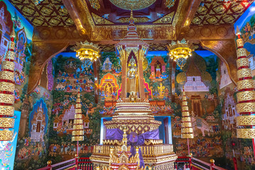 Fototapeta na wymiar paints of life of buddha in a temple of thailand. chiang mai.