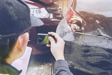 Insurance agent working on car accident claim process
