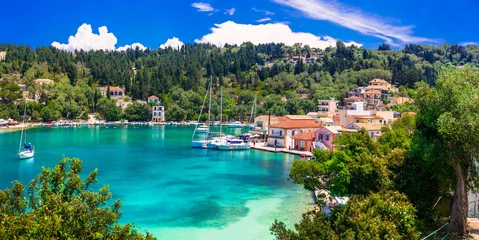 Tuinposter Picturesque fishing village Lakka in Paxos with turquoise sea, Ionian islands of Greece © Freesurf