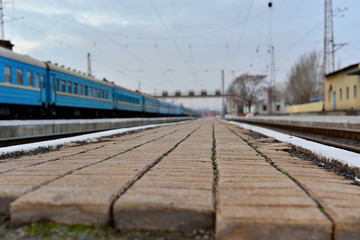 Naklejka premium Passenger and freight train. Passenger diesel train traveling speed railway wagons journey light