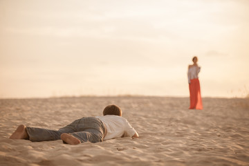 Man. Desert. Thirst. The girl was a Mirage. Sand. Heat. Sun. Suffering. Struggle. Resistance. Crisis. Drought.