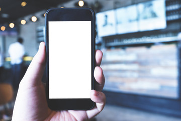 Hand on smartphone Blank Screen on Blur background