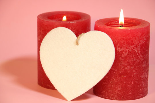 Romantic Red Candles And White Heart