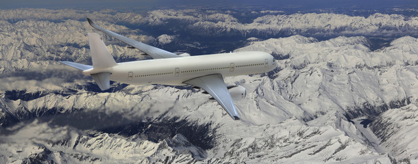 Fototapeta premium Passagierflugzeug über den Alpen im Winter, Panorama