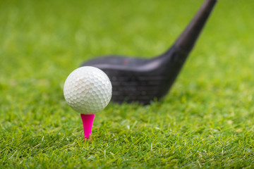 Shot of golf ball with golf club