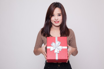 Fototapeta premium Young Asian woman with a gift box.