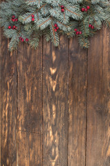 Christmas composition of fir branches and berries of viburnum on a white background isolated. Top view with copy space.