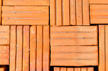 Orange brick used in construction architecture, background texture