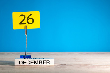 December 26th mockup. Day 26 of december month, calendar on blue background. Winter time. Empty...