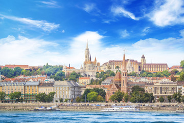 Fototapeta premium A stark view of the Fishermen's Bastion, the Church of St. Matthias, the Calvinist Church on the Danube Embankment in Budapest, Hungary