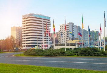 Countries flags, modern business office building