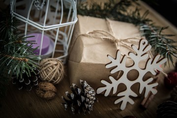 closeup of Christmas gift and Christmas candle.