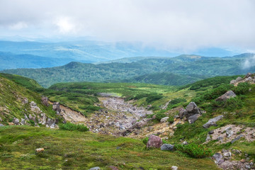 Fototapeta na wymiar Hiking trail toward Asahidake in Daisetsuzan National Park Hokkaido, Japan.
