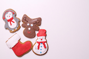 Christmas cookie boots, penguin, snowman, deer on background