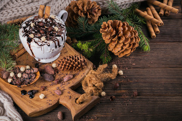 Obraz na płótnie Canvas Christmas or New Year composition with hot chocolate or cocoa drink with whipped cream