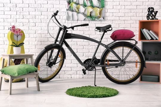 Child's room interior with bicycle and shelving unit