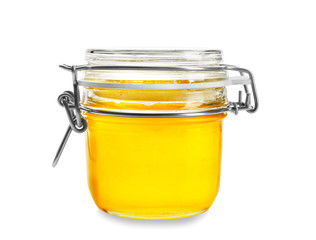 Jar with aromatic honey on white background