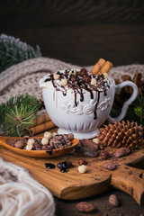Christmas or New Year composition with hot chocolate or cocoa drink with whipped cream