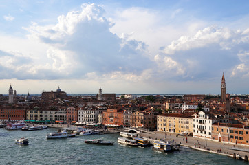 panoramic view of Venice from the height of the cruise ship to Piazza San Marco and the Ducale, or Doge's Palace. on the Grand canal many boats, river transport, in the background of ancient architect