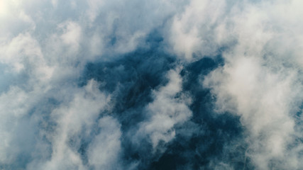 Fototapeta premium Cloud scape above carpathian mountains shot at sunset