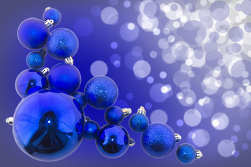 Blue bokeh abstract background with blue shiny balls