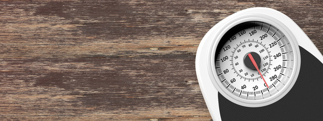 Naklejka premium Bathroom scale on an old wooden floor background. Copyspace for text. 3d illustration