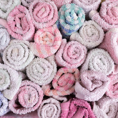 Pile of cloth, hand towel in wooden basket