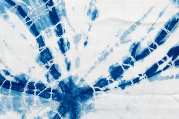 The fabric indigo tie dye as a background and texture.