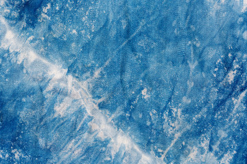 The fabric indigo tie dye as a background and texture.