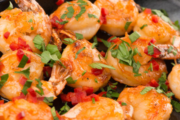 fried shrimps with fresh parsley and paprika