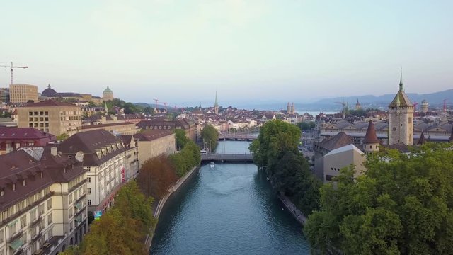 Switzerland Zurich Aerial v21 Flying low over Limmat River and Platzspitz park area 8/17
