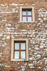 KRAKOW,POLAND - FEBRUARY 12, 2017: Wall with the windows at The Benedictine Abbey in Tyniec