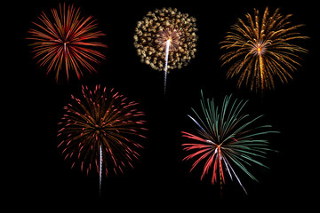 Colorful assorted fireworks selection on a black background.