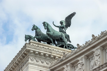 Fototapeta na wymiar state on rooftop at Piazza Venezia in Rome