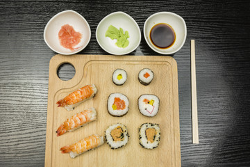 Board with a sushi set.